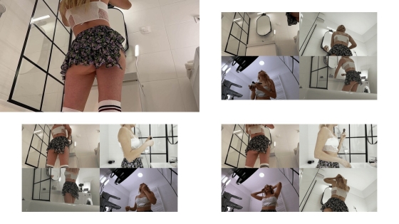 Big boobs hot blonde in a cut modified short mini skirt in the bathroom shows her big tits and legs